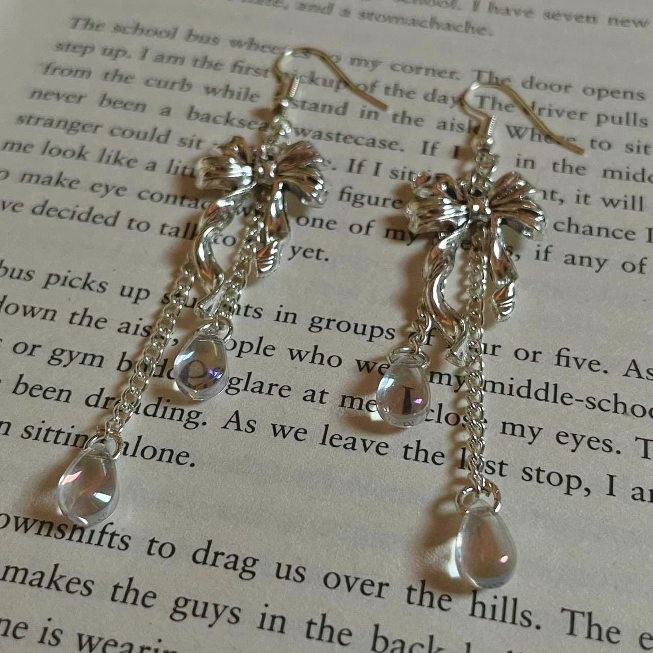 bow iridescent teardrop earrings