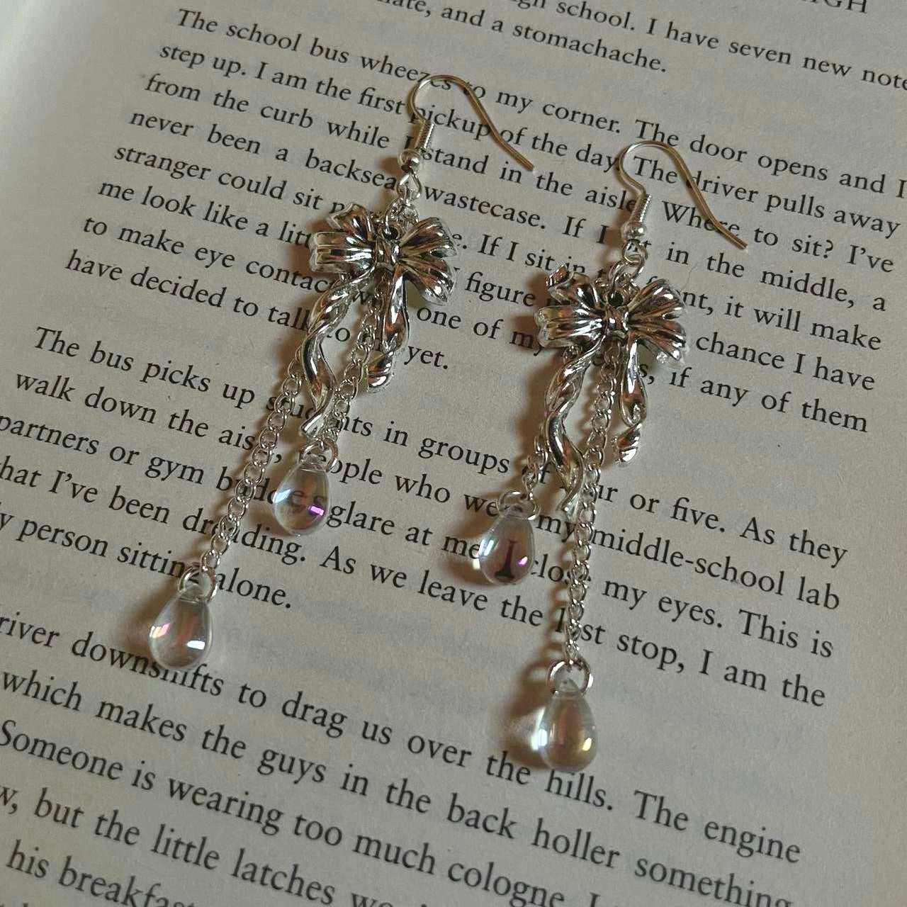 bow iridescent teardrop earrings