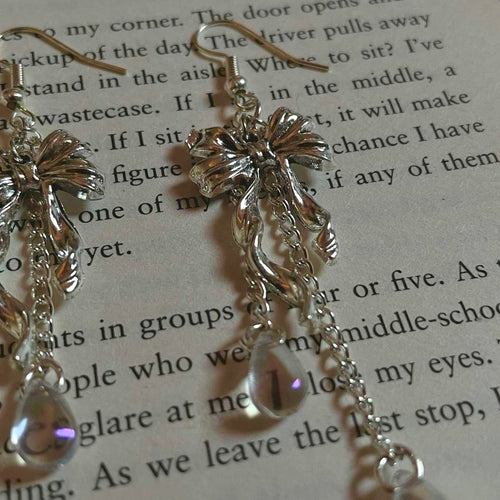 bow iridescent teardrop earrings
